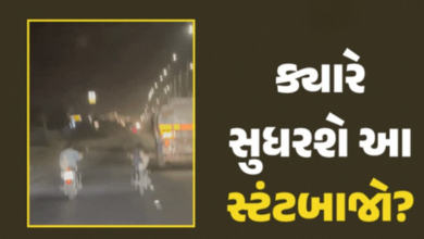 રાજકોટમાં સોખડા-બેડી ચોકડી વચ્ચે સ્ટંટબાજો બન્યા બેફામ, બાઈકની સીટ પર સૂઈને યુવાને સ્ટંટ કર્યો,